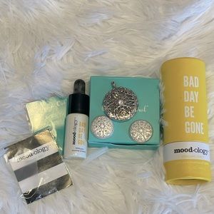 Origami Owl silver locket with Mood-ology oil and discs